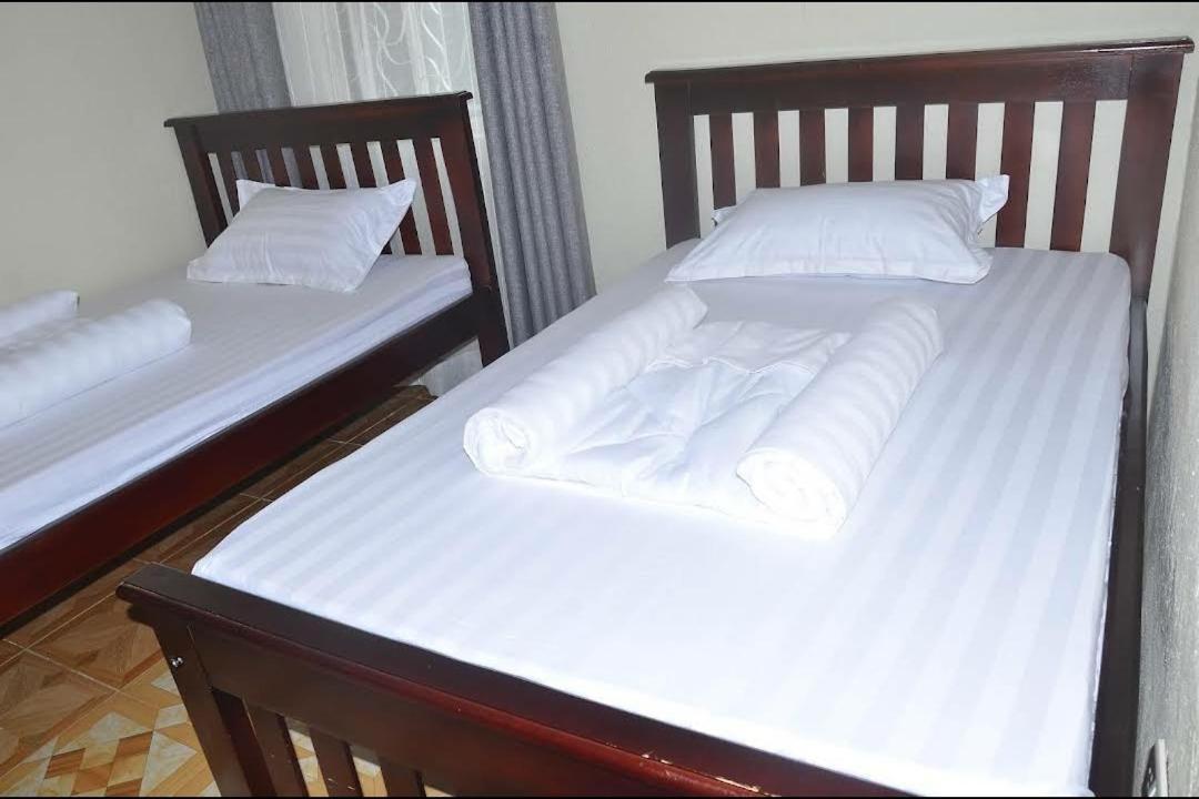 Migingo Suites Ентеббе Екстер'єр фото